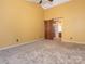 Bright, carpeted bedroom featuring a sliding barn door that leads to the ensuite at 13037 Angel Oak Dr, Huntersville, NC 28078