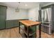 Well-equipped kitchen with stainless steel appliances, ample cabinet space, and an island offering practical functionality at 13037 Angel Oak Dr, Huntersville, NC 28078