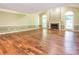Large living room showcasing hardwood flooring, fireplace and architectural details, creating a sophisticated atmosphere at 13037 Angel Oak Dr, Huntersville, NC 28078