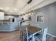 Dining room features a modern light fixture, stylish table, and decor that enhances the inviting atmosphere at 1324 Mona Vale Dr, Huntersville, NC 28078