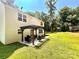 Well-maintained backyard with a patio featuring an outdoor dining area and plenty of space for recreation at 1528 Magnolia Dr # 8, Lancaster, SC 29720