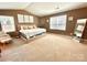 Bedroom featuring neutral walls, a large window, and a comfortable upholstered bed at 1528 Magnolia Dr # 8, Lancaster, SC 29720