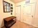 Hallway with neutral walls, carpet, and multiple doors at 1528 Magnolia Dr # 8, Lancaster, SC 29720