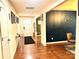 Inviting hallway with hardwood floors, stylish decor and a glimpse of the living area at 1528 Magnolia Dr # 8, Lancaster, SC 29720