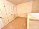 Upstairs hallway with neutral carpet and multiple doors at 1528 Magnolia Dr # 8, Lancaster, SC 29720