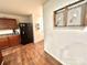 Kitchen area featuring dark cabinets, stainless steel appliances, and hardwood floors at 1528 Magnolia Dr # 8, Lancaster, SC 29720