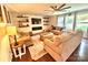 Bright living room with plush sofas, floating shelves, and a cozy fireplace, perfect for relaxation and entertaining at 1528 Magnolia Dr # 8, Lancaster, SC 29720