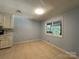 Bright dining area features tile floors, a window, and is conveniently situated next to the kitchen area at 1590 Springpoint Rd # B, Rock Hill, SC 29732