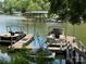 Picturesque view of a private boat dock on a tranquil lake, ideal for boating enthusiasts at 1590 Springpoint Rd # B, Rock Hill, SC 29732