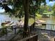 Private boat dock on a serene lake with multiple boats, offering scenic waterfront living at 1590 Springpoint Rd # B, Rock Hill, SC 29732