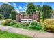 Meadow Glen community entrance sign with brick pillars and manicured landscaping at 164 Meadow Glen Dr, Troutman, NC 28166