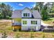 Rear exterior of house with a deck overlooking the backyard at 164 Meadow Glen Dr, Troutman, NC 28166