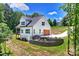 Exterior elevation of modern home with finished garage at 164 Meadow Glen Dr, Troutman, NC 28166