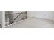 Carpeted hallway featuring an ornate metal railing and white trim at 164 Meadow Glen Dr, Troutman, NC 28166
