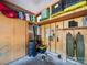Organized garage space featuring pegboard walls, overhead storage, and utility systems at 16411 Greybriar Forest Ln, Charlotte, NC 28278