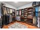 This walk-in closet is equipped with custom shelving and drawers for optimal organization at 1805 Trading Path Ln, Waxhaw, NC 28173