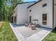Back patio with seating area perfect for entertaining and relaxing at 202 Walden Ln, Weddington, NC 28104