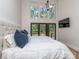 This bedroom boasts a large window, and a tv at 202 Walden Ln, Weddington, NC 28104