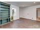 Bonus room with tile floors and built-in shelving at 202 Walden Ln, Weddington, NC 28104