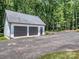 A two car garage with driveway and basketball court at 202 Walden Ln, Weddington, NC 28104
