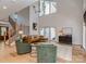 Living room with high ceilings and view of staircase at 202 Walden Ln, Weddington, NC 28104
