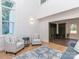 Bright living room featuring hardwood floors and a view to a mud room at 202 Walden Ln, Weddington, NC 28104