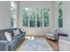 Bright sun room with hardwood flooring and multiple windows at 202 Walden Ln, Weddington, NC 28104
