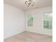 Bedroom with plush carpeting, a modern light fixture, and large windows at 2100 Goddard Way, Waxhaw, NC 28173