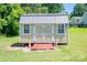 Exterior view of sturdy shed with double doors and a new metal roof at 219 E Boston Ave # 141516, Bessemer City, NC 28016