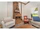 Close-up of the living room fireplace with mantel and wood accents at 220 Low Water Bridge Rd, Troy, NC 27371