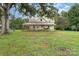 Picturesque home with a large front yard and inviting porch, ideal for a peaceful countryside lifestyle at 220 Low Water Bridge Rd, Troy, NC 27371