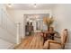 Inviting entryway with hardwood flooring, leading to an open floor plan perfect for entertaining guests at 220 Low Water Bridge Rd, Troy, NC 27371