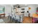 Spacious kitchen island with barstool seating, stainless steel appliances, and a pot rack at 2282 Redstone Dr, York, SC 29745