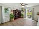 Bright living room featuring sliding glass doors to the yard and a stylish decorative bookshelf at 2282 Redstone Dr, York, SC 29745