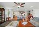 Well-lit living area showcasing an open layout, kitchen view, and stylish contemporary decor at 2282 Redstone Dr, York, SC 29745
