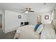 Comfortable main bedroom featuring neutral walls, ceiling fan, and view of the attached bathroom at 2282 Redstone Dr, York, SC 29745