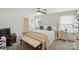 Comfortable main bedroom featuring neutral walls, white furniture, and a ceiling fan for added comfort at 2282 Redstone Dr, York, SC 29745