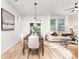 Dining area with a modern table and access to natural light at 2818 Old Steele Creek Rd, Charlotte, NC 28208