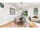 Bright dining area with modern furnishings and a view of the backyard at 2818 Old Steele Creek Rd, Charlotte, NC 28208