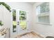 Bright entryway with a front door and a lovely view of the front yard at 2818 Old Steele Creek Rd, Charlotte, NC 28208