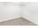 Bright walk-in closet features ample storage space with wire shelving at 2818 Old Steele Creek Rd, Charlotte, NC 28208