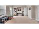 Spacious bonus room providing flexible living space, perfect for recreation or relaxation at 282 Harrison Ln, Locust, NC 28097