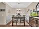 Cozy dining room with a traditional table and seating for six at 282 Harrison Ln, Locust, NC 28097