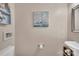 Stylish powder room featuring pedestal sink, toilet, and modern decor, creating a charming space at 282 Harrison Ln, Locust, NC 28097