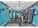 Home gym equipped with modern fitness equipment and wall-mounted TV at 282 Harrison Ln, Locust, NC 28097