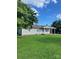 Charming single-story home with a well-manicured lawn and covered front porch at 28518 Flint Ridge Rd, Albemarle, NC 28001