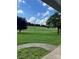 Serene view from the porch showcasing a lush green front yard at 28518 Flint Ridge Rd, Albemarle, NC 28001
