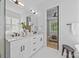 Elegant bathroom featuring double vanity, modern fixtures, and a clean, contemporary design at 3949 Plainview Rd, Charlotte, NC 28208