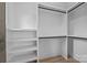 Walk-in closet with custom shelving and ample storage space for an organized wardrobe at 3949 Plainview Rd, Charlotte, NC 28208