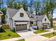Beautiful new construction with a two-car garage, covered porch and lovely curb appeal at 3949 Plainview Rd, Charlotte, NC 28208